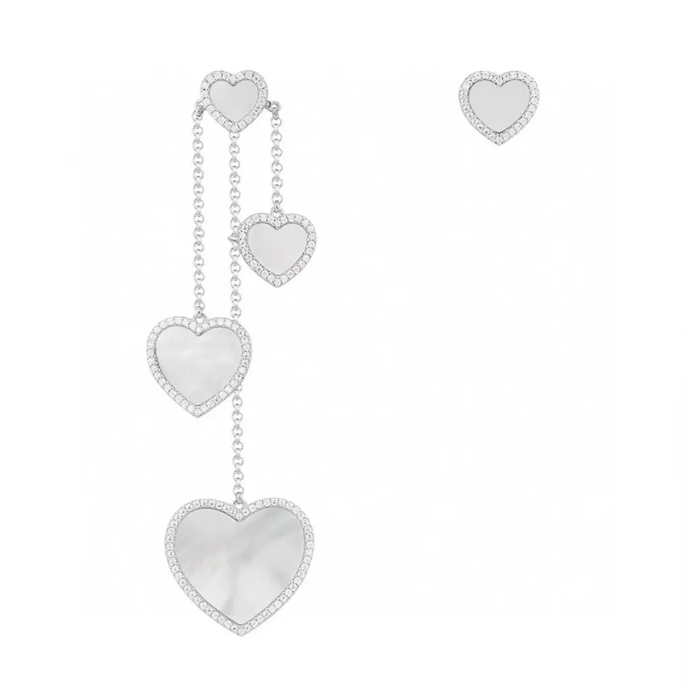 Apm monaco asymmetrical white mother-of-pearl heart earrings