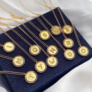 Apm monaco rainbow letter necklace
