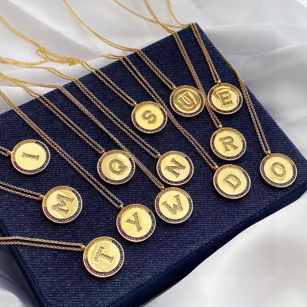 Apm monaco rainbow letter necklace