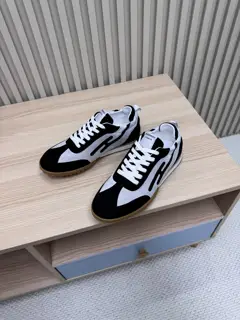 Hermès casual sneakers Suede goatskin sneakers decorated with contrasting patterns and
