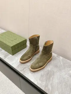 Gucci equestrian boots. I have to say that G is really cool this season