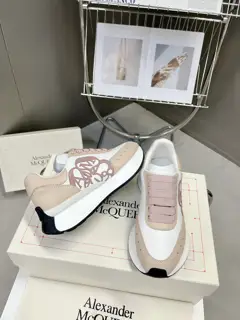 Alexander McQueen Sprint sports couple style. The side of the shoe is decorated with a
