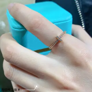 Tiffany streamlined cross ring is a small cross diamond ring