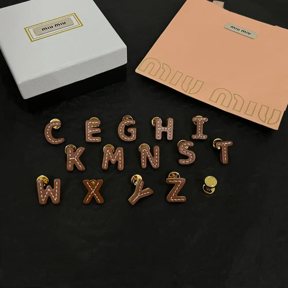 miumiu cowhide earrings