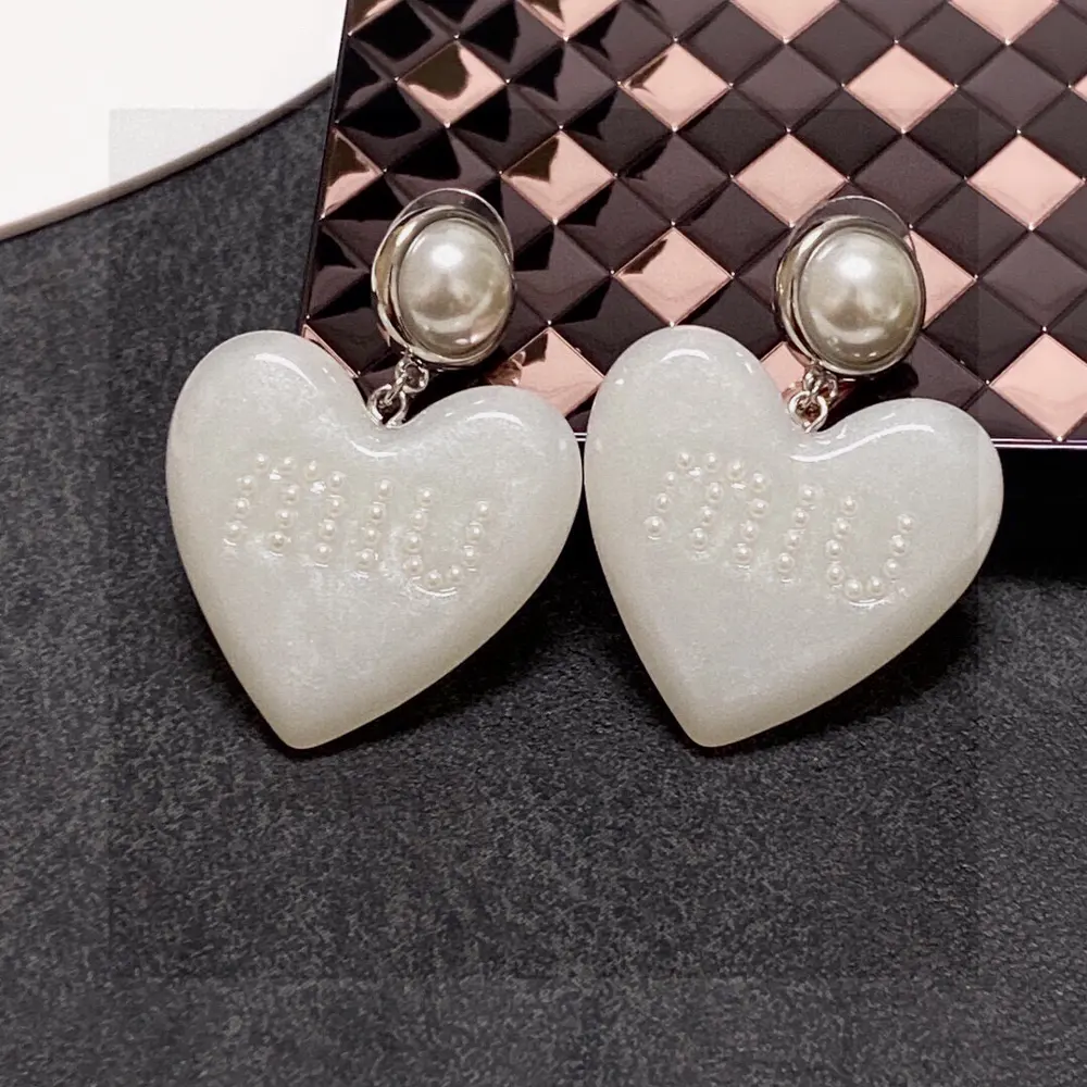 miumiu big heart earrings