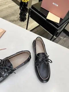 Miu Miu Miu’s rubbed retro loafers are hot