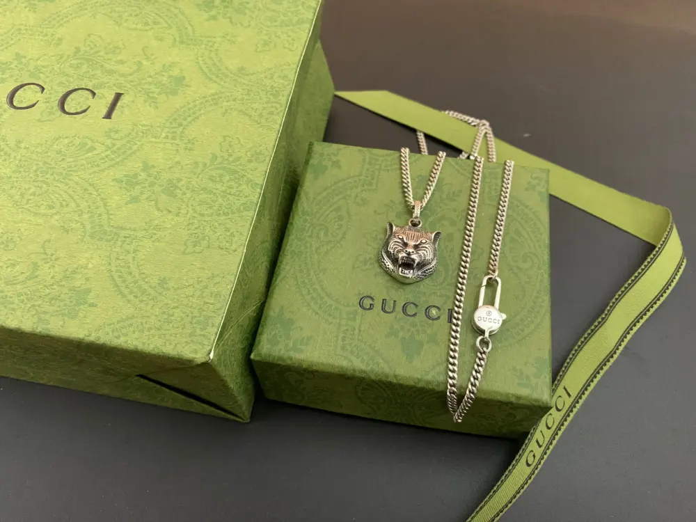 Gucci tiger head cross necklace