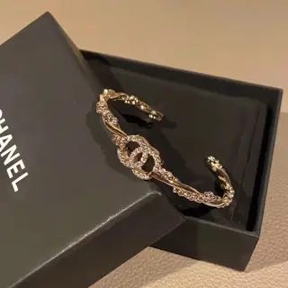 Chanel rhinestone twisted light gold bracelet