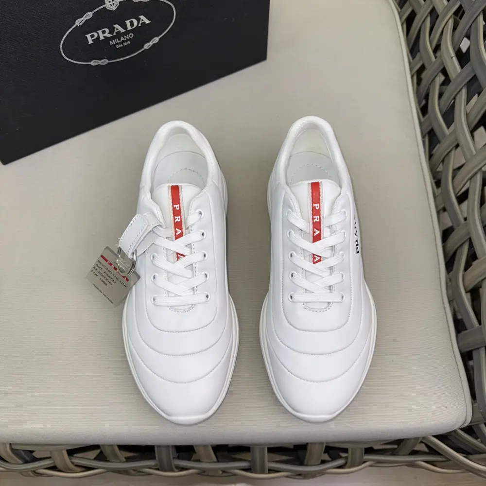 Prada men’s lace-up casual sneakers|Imported Nappa leather upper|Layered stitching design