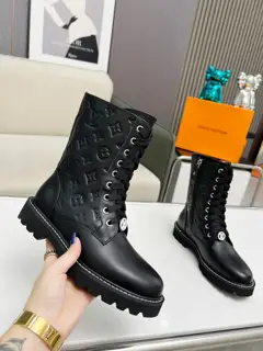 Louis Vuitton Territory mid-calf boots are a combination of smooth cowhide and Monogram