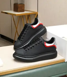 McQueen couple’s white shoes