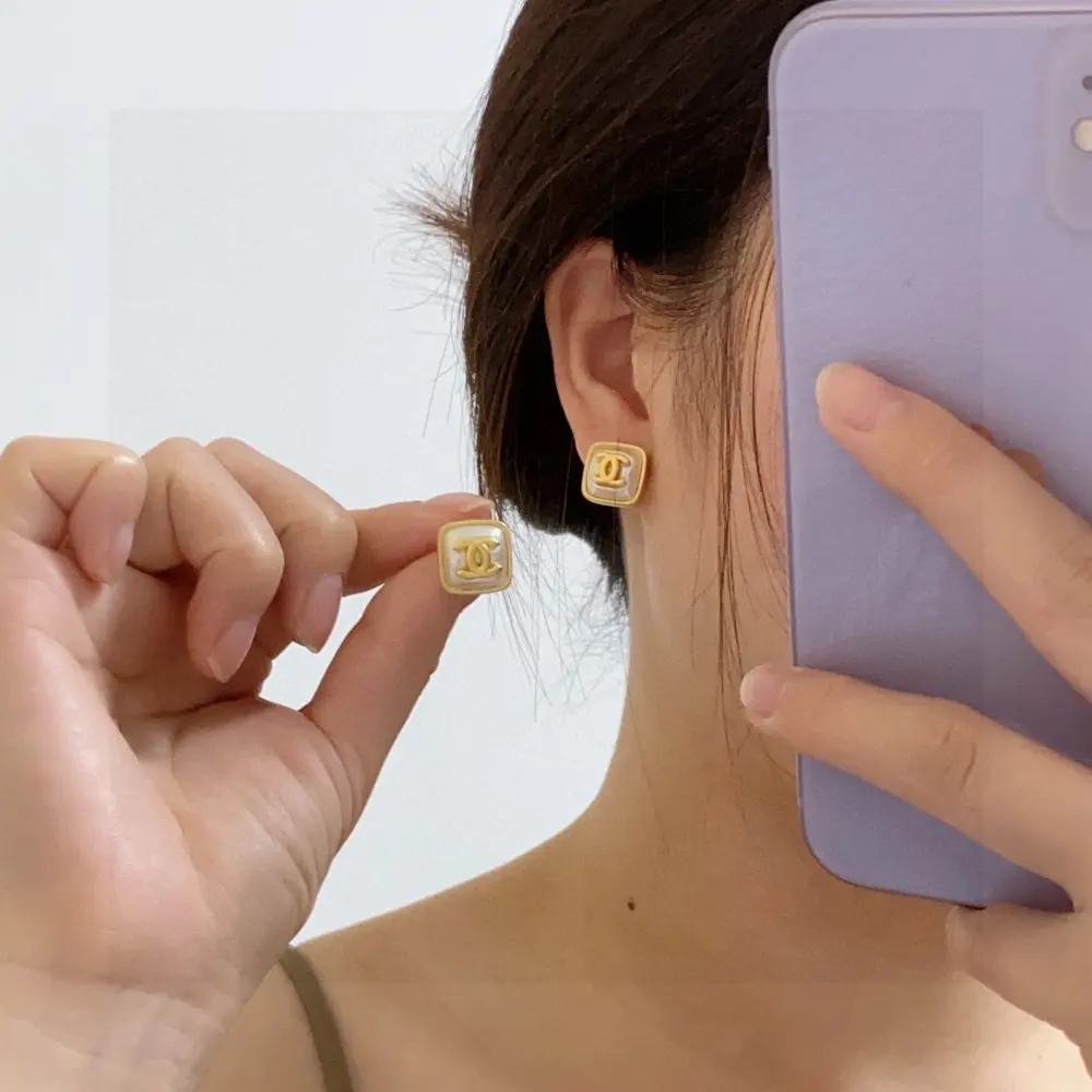Chanel Double C simple antique gold earrings
