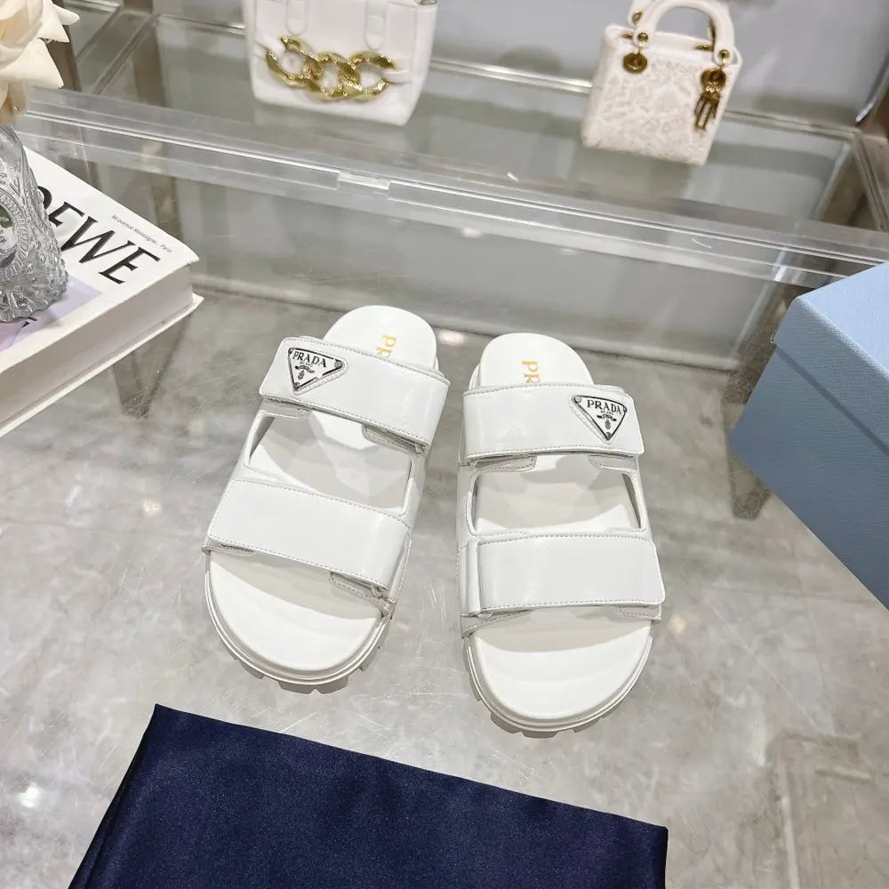 Prada’s latest Prada slippers are 90s-style slipper-style sandals that exude a feminine