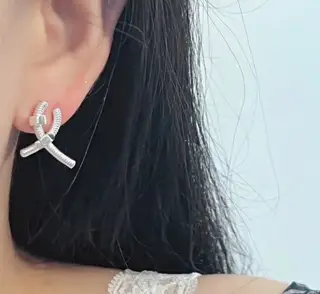 Cartier cross screw earrings