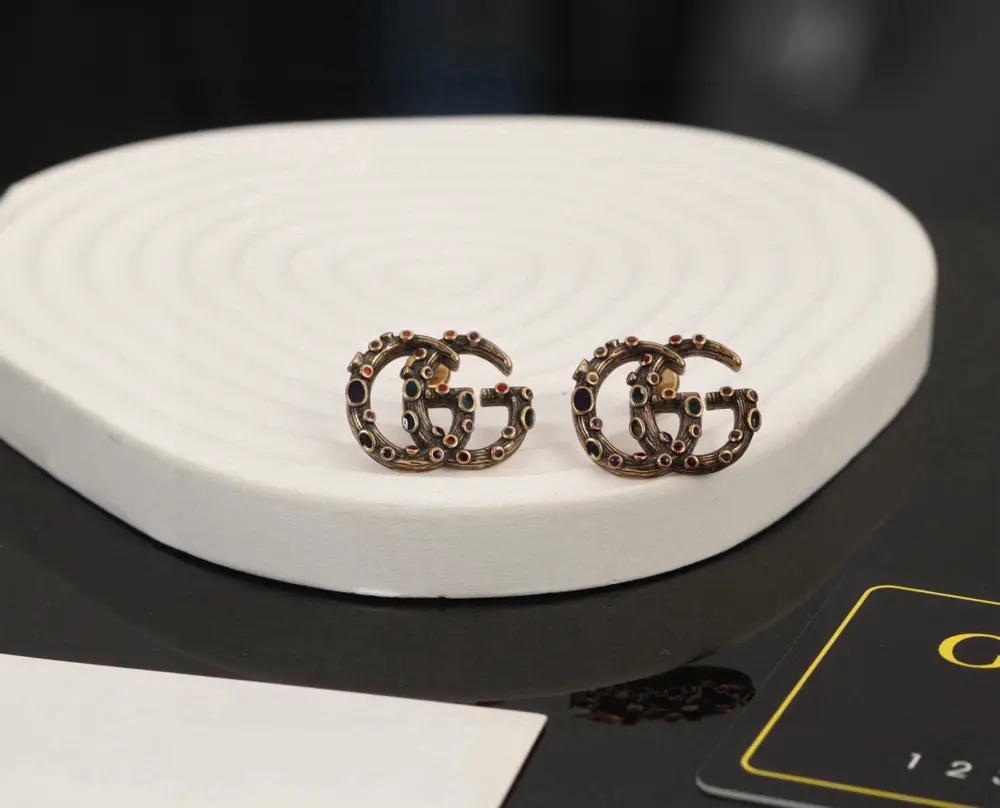 Gucci lion head earrings