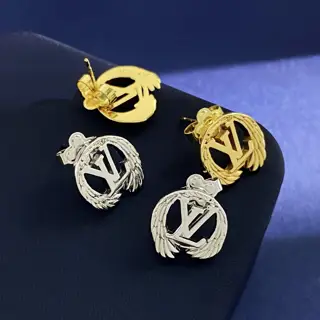 Louis Vuitton glossy metal badge earrings