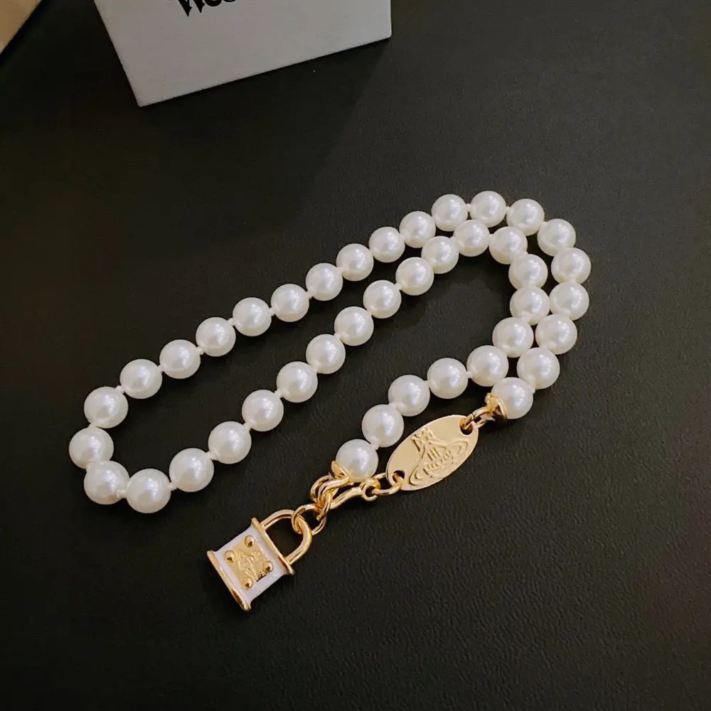 Vivienne Westwood classic pearl lock Saturn necklace