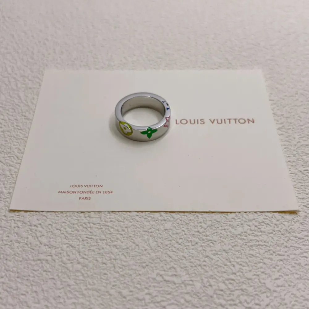 Louis Vuitton silver logo print ring