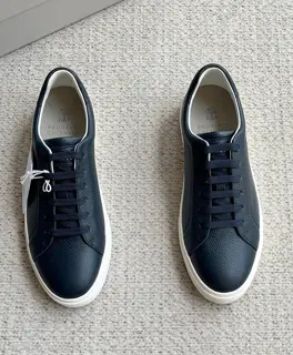 Brunello Cucinelli color-blocked sports flats for men. This pair of flat sports shoes