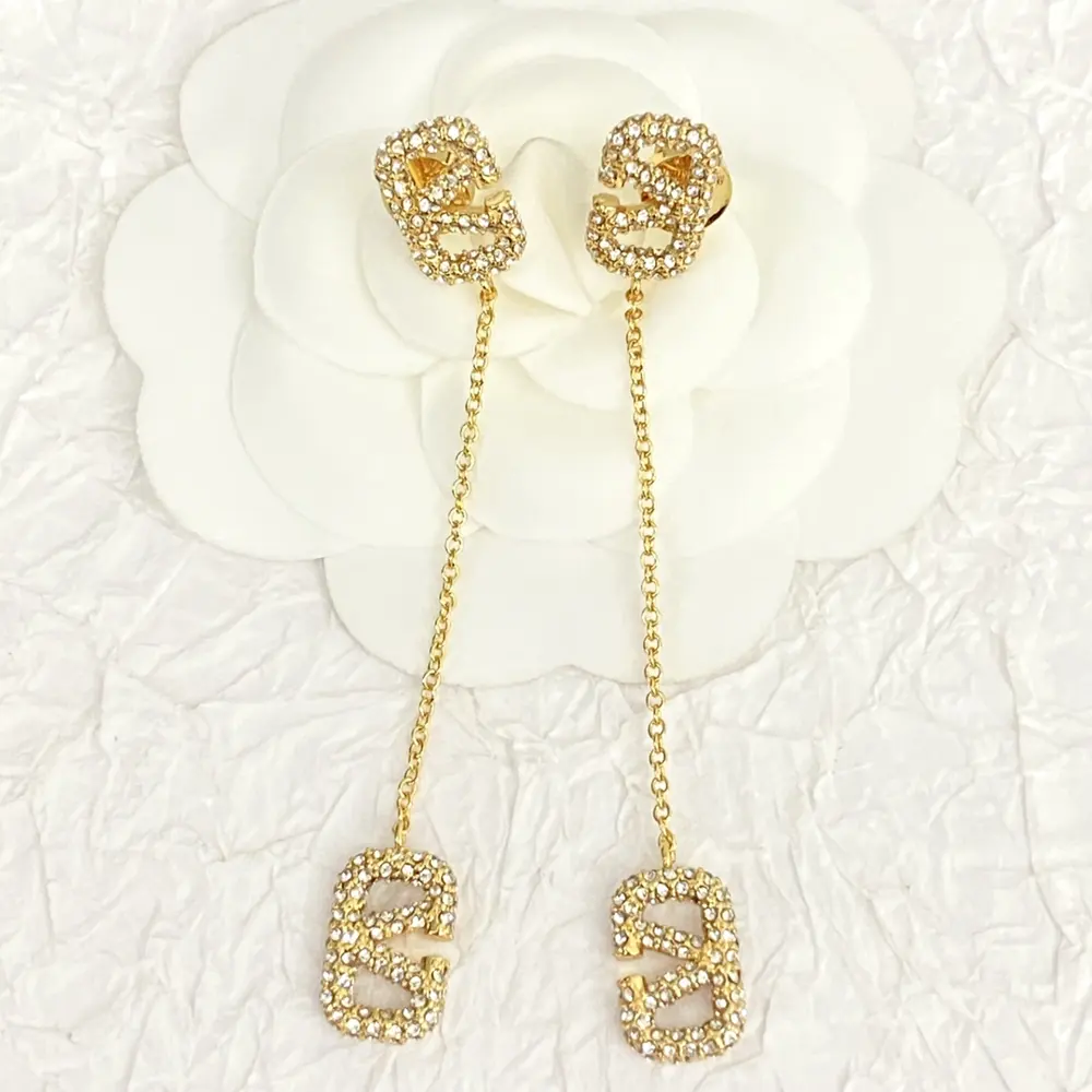 Valentino Logo diamond pendant earrings