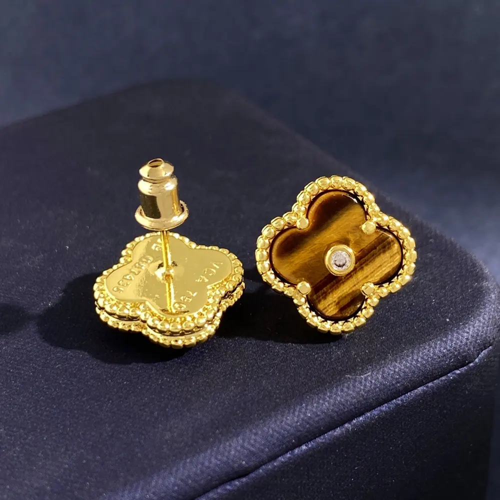 Van Cleef & Arpels Raised Dot Single Diamond Four-Leaf Clover Earrings