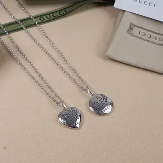 Gucci flower and bird medal/heart medal necklace