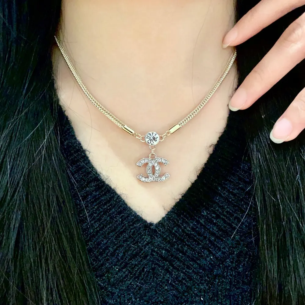 Chanel vintage letter necklace Chanel’s styles really need no introduction Each one is