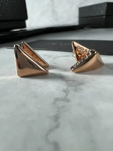 Prada triangle logo earrings