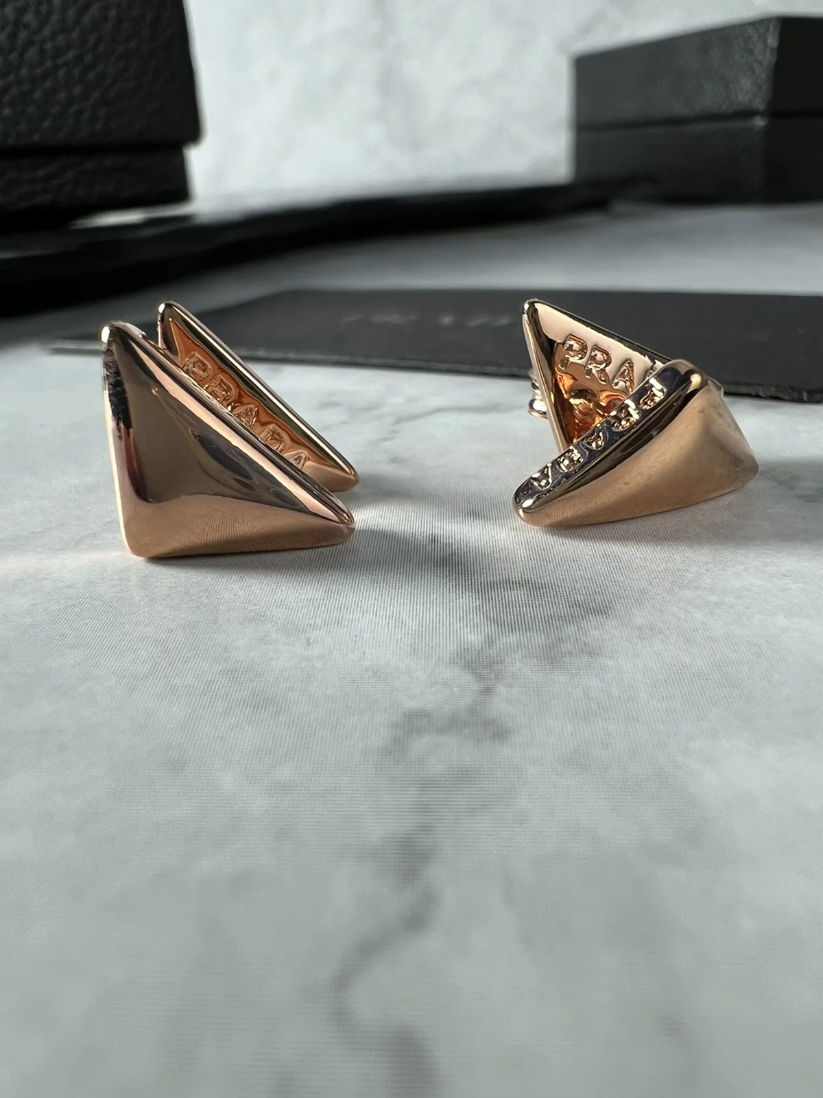 Prada triangle logo earrings