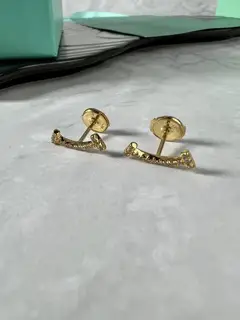 Tiffany smiley face diamond earrings