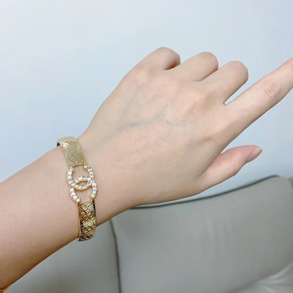 Chanel C letter hollow light gold bracelet