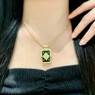 Chanel vintage letter necklace