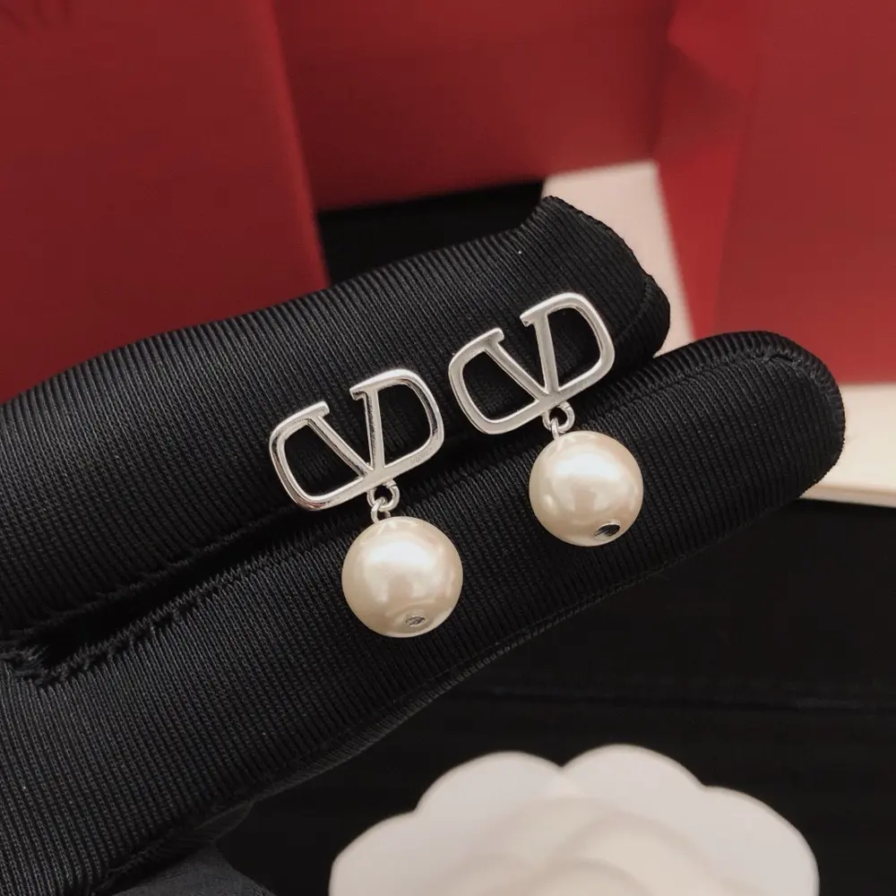 Valentino earrings with pearls and silver