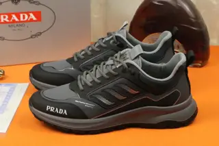Prada Italian men’s shoes are featured on the cover of the quarterly fashion magazine