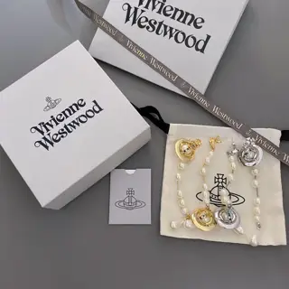 Vivienne Westwood Saturn Broken Pearl Earrings