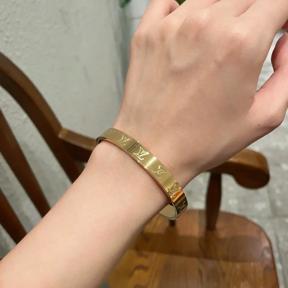 Louis Vuitton engraved lettering bracelet