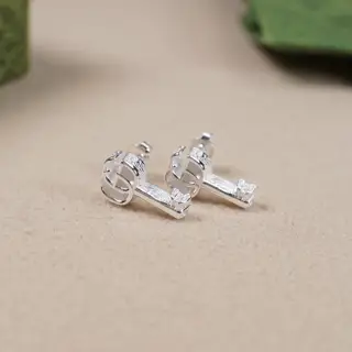 Gucci interlocking double G shiny silver key earrings
