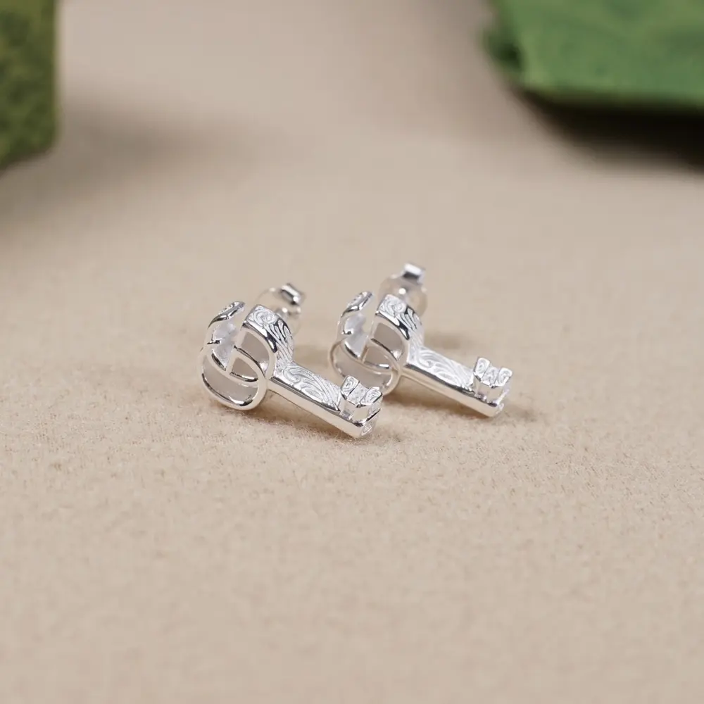Gucci interlocking double G shiny silver key earrings