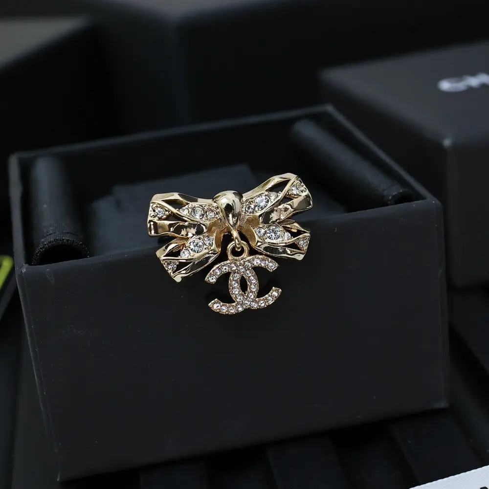 Chanel 24B light gold bow ring