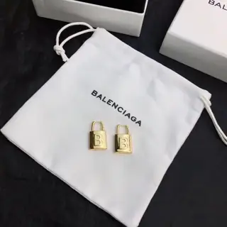 Balenciaga gold stud earrings