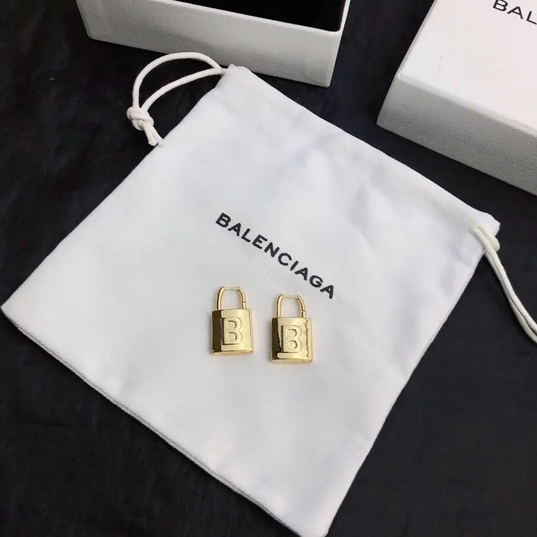 Balenciaga gold stud earrings