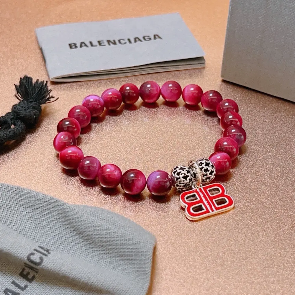 Balenciaga natural tiger eye stone bracelet