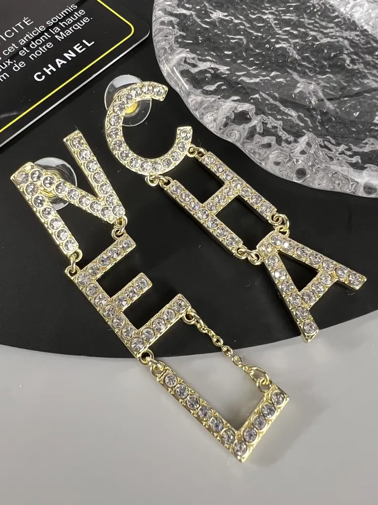 Chanel diamond letter earrings