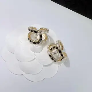Chanel black and white embossed letter ring
