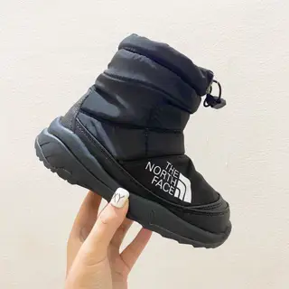 The North Face high-top children’s snow boots