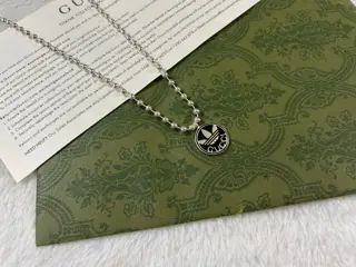 Gucci Adidas co-branded black enamel medal necklace