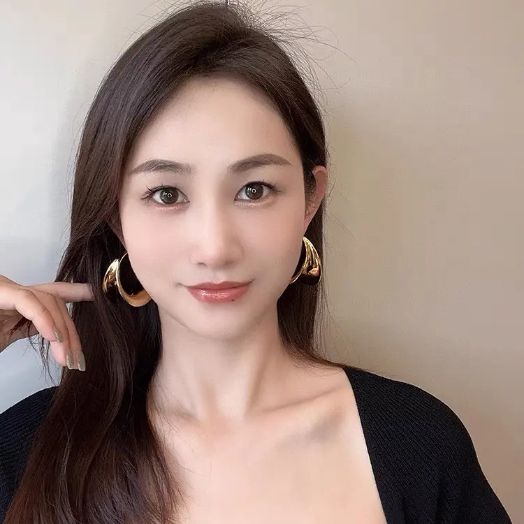 Yves Saint Laurent letter earrings
