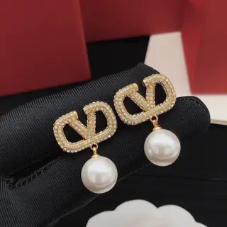 Valentino V-shaped earrings with diamonds and pearls
