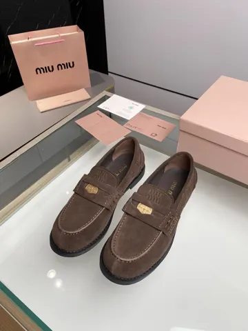 MIUMIU coin loafers