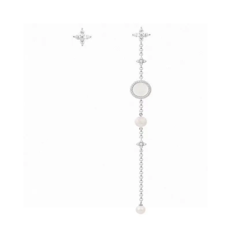 APM Monaco asymmetrical long shell earrings